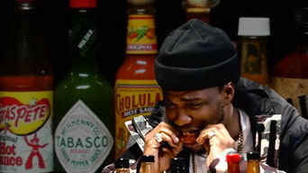 Curren$y Talks Munchies, Industry Games, and Rap Dogs While Eating Spicy Wings